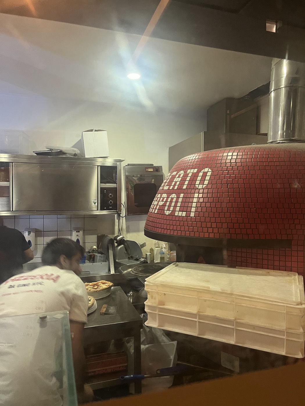 Traditional red mosaic wood-fired pizza oven